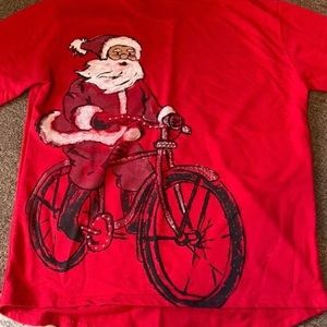 M & C Sportswear Santa on bicycle
